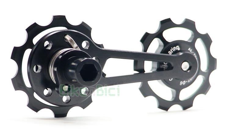 COMAS FACTORY TRIALS CHAIN TENSIONER - Chain tensioner from Comas brand, Factory range. 10T pulleys made in aluminium. Pulleys turn on CERAMIC BEARINGS. Aluminium body and templated steel spring. Many spring tensioner anchorages. Black finished. 41 grams of weight.