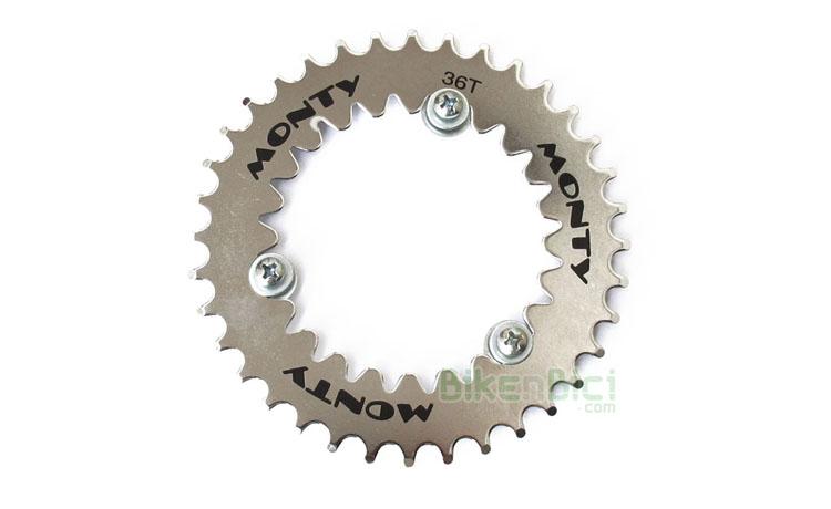 Chainwheel Trialsin MONTY CHAINWHEEL KIT 36/24T steel - Original chainwheel Monty kit to convert the 24T bicycles chainwheel in a 36T chainwheel. This kit was used in some models as T-215 and T-19 serie 1. The kit includes the three bolts to fix this chainwheel on the 24T one.