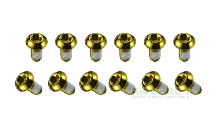 BOLTS DISC ASHIMA GOLD (12 units) - Kit composed by 12 units of 6mm Torx screws from Ashima brand to fix rotors in disc hubs. Made in steel. Fits all hubs with standard international 6 screws system. Finished in gold colour.