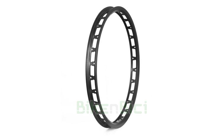 RIM COMAS 20 INCHES 32 SPOKES - Rear wheel 20 inches from Comas brand. Made in high quality 6061-T6 aluminium. W shaped sideways for an extrem strength. Lateral spokes holes. For 32 holes hubs. Black matt anodised. 12mm lateral walls. 32mm wide. 398 grams of weight.